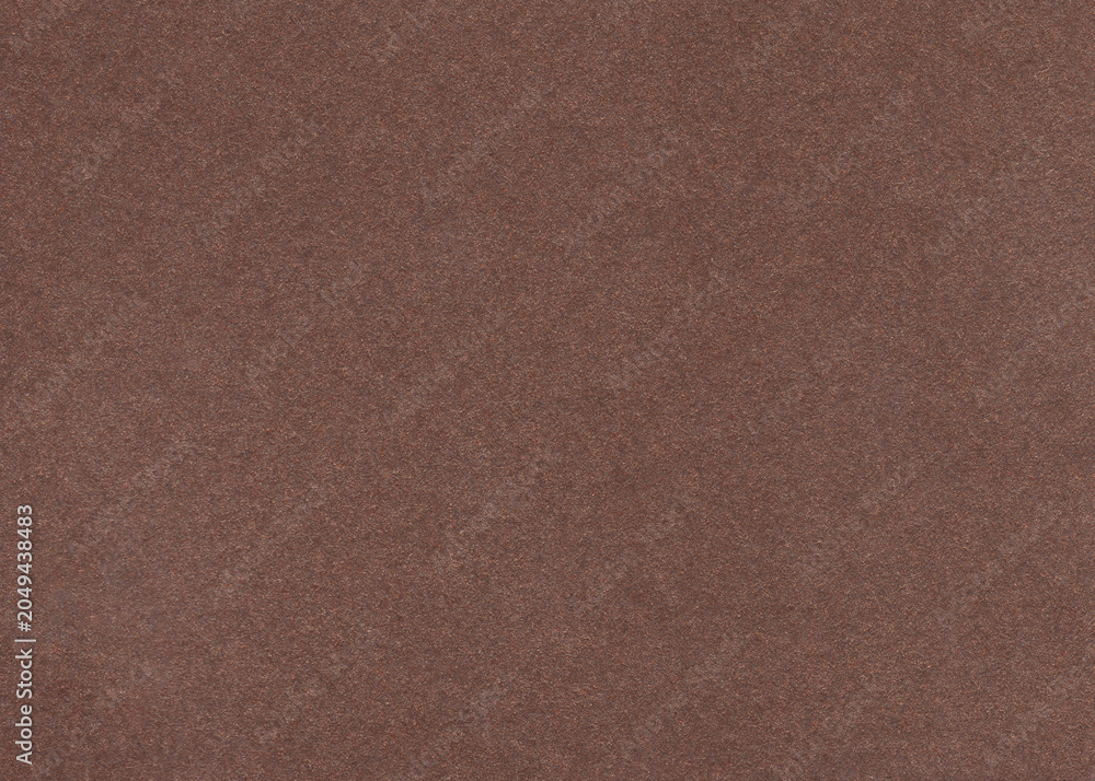 Fototapeta premium Brown corrugated kraft paper texture with a linear pattern. Minimal background perfect for branding, packaging and eco compositions.