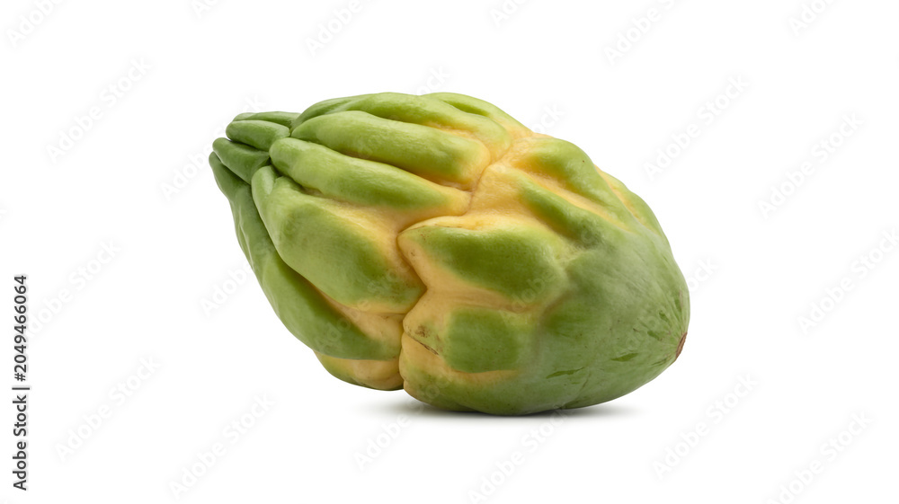 Fototapeta premium Unusual green chayote squash with yellow markings on a white background