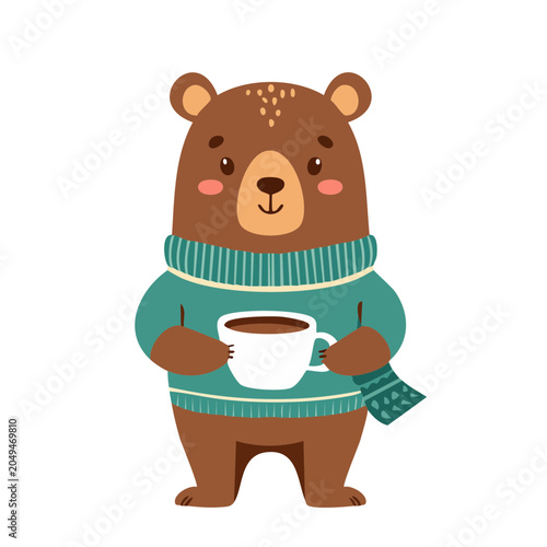 Cute bear in sweater holding a cup of coffee
