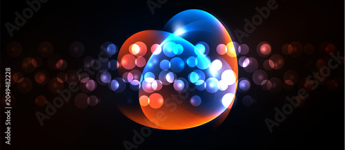 Fotografia Bright glowing orbs overlap, creating vibrant light effects against dark background