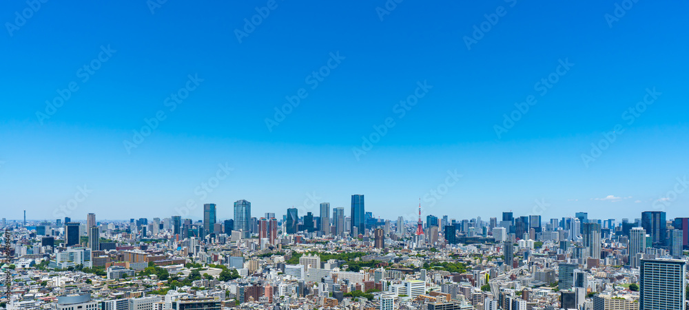 Fototapeta premium Tokyo skyline with blue sky and copy space in Japan