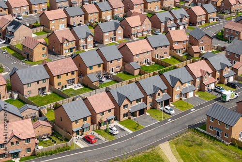 Photos Rows of small new build houses built because of housing shortage, England