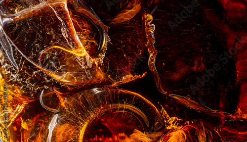 Quadro em tela Extreme Close-up of Ice Cubes in Cola,Macro,A detailed macro shot capturing the vibrant amber hues and refreshing texture of ice cubes submerged in a dark carbonated cola beverage