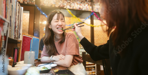 Authenticity lgbt lover two asian woman couple dating at izakaya japanese bar enjoy talking together