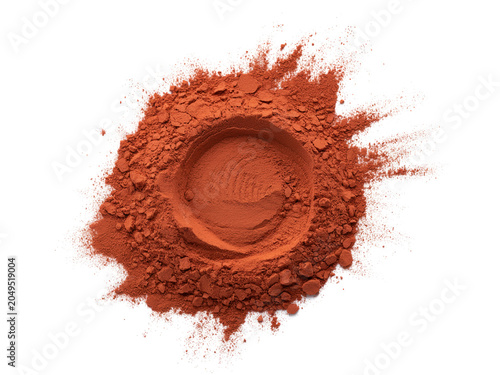 Red cosmetic clay powder pile with circular swirl on white background