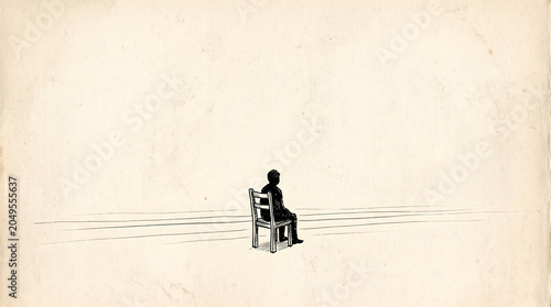 A lonely person sits on a wooden chair in the middle of a vast empty space