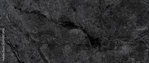 Fotografía Marble background reveals a dark rustic black stone surface with detailed natura