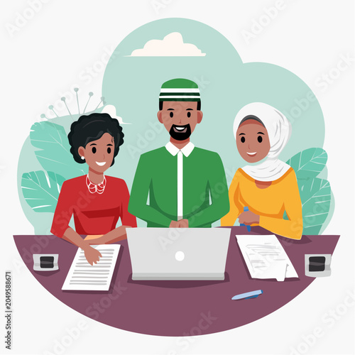 Diverse team collaborating at a table with laptop and documents