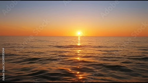 The images depict a tranquil scene of a sunset over a calm ocean. The main subject is the sun positioned near the horizon, casting a warm, golden reflection across the surface of the water