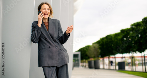 Woman talking on phone whil...