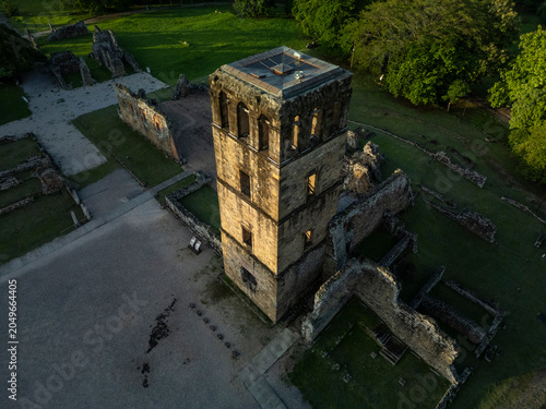 Ancient stone cathedral tower standing among archaeological ruins of old Panama city, highlighting the rich history and architectural heritage of Central America - stock photo