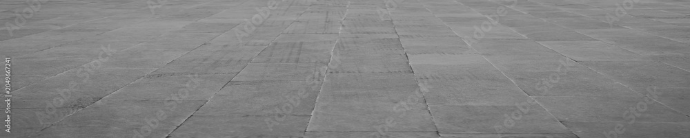 Obraz premium empty stone floor top in perspective. grey tile floor background in perspective view. line. empty copy space stone street. pavement. Granite outdoor tiled floor. gray granite. Marble texture