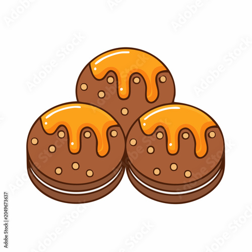 Three chocolate cookies with caramel icing and sprinkles