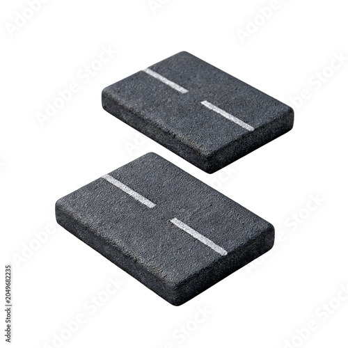 Two gray asphalt road blocks with white lines on a plain white background, used for traffic control and road safety measures.