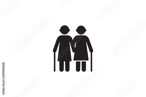 Two elderly women walking together holding canes, symbolizing friendship, support, and aging gracefully.