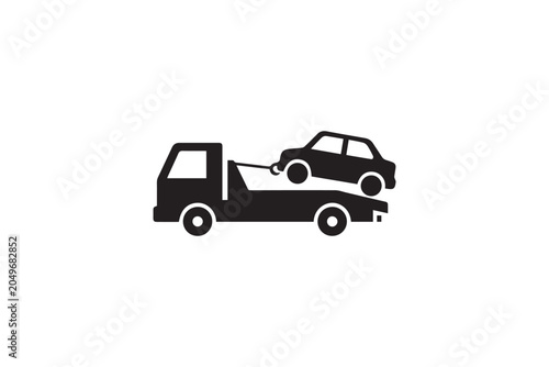 Tow truck lifting damaged car from road recovery vehicle transporting automobile help service assistance vehicle accident breakdown assistance.
