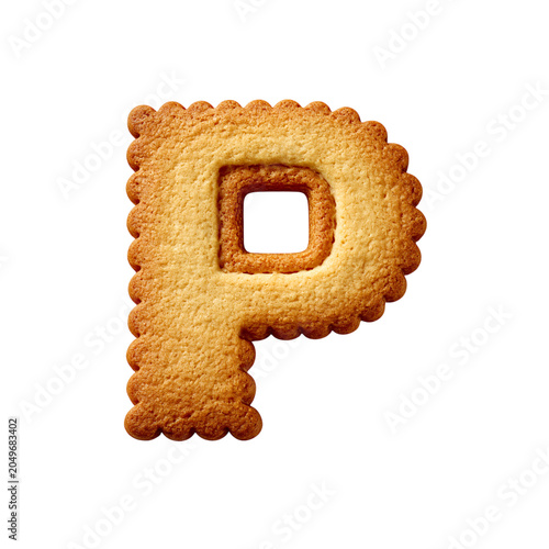 A large golden brown cookie in the shape of the letter P