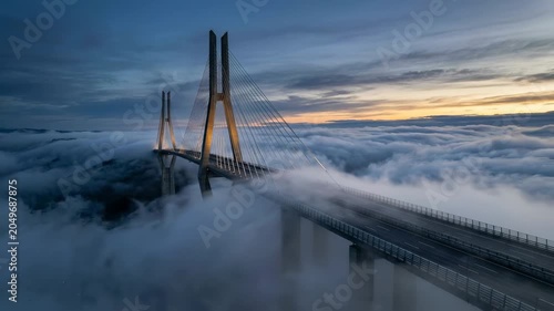 Mega-Scale Cable-Stayed Bridge Emerging from Advection Fog Over Ocean Currents