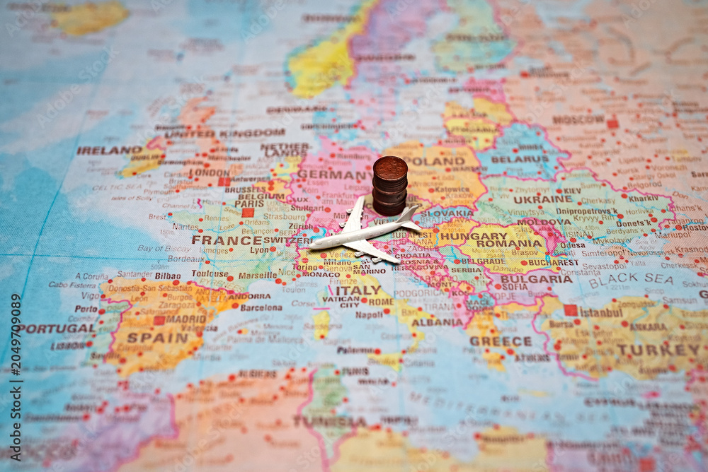 Naklejka premium Airplane and fuel barrel on a map of Europe.