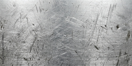 Weathered brushed metal texture background with texture overlay scratched background industrial material distressed metallic construction architecture abstract close up reflection