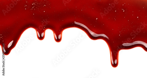 Dripping blood isolated on white background. Flowing bloody stains, splashes and drops. Trail and drips red blood close up
