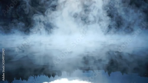 Dense white smoke rising and spreading over a dark reflective surface creating a mysterious and atmospheric effect