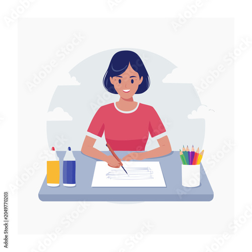 Young girl drawing at a desk with art supplies