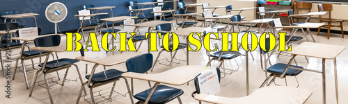 Back to school written on classroom desks in an American Classroom