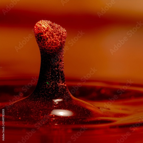 Close-up of Red Wine Splash in Slow Motion.