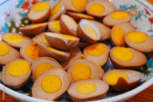 Half-cut boiled seasoned eggs (Ajitama), traditional Japanese food - 日本料理 煮卵 味付け玉子の断面 
