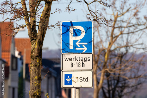 Fotografie German parking sign declaring weekday limited time