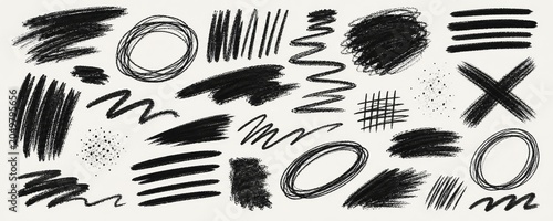 Collection of abstract black chalk scribble textures and shapes, including lines, circles, crosses, and splatters, arranged randomly.