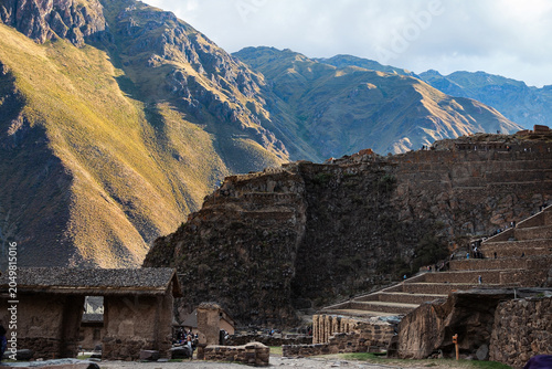 Tablou pe pânză Andes, Peru - April 30, 2019: Ancient Inca terraces and ruins in Sacred Valley P
