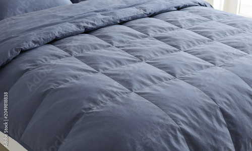 Bed with Blue Comforter