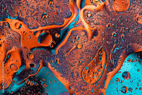 Tableau sur toile Fiery orange and blue liquid ink abstract art
