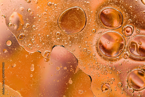 Cuadro en lienzo Warm amber oil bubble abstract texture photography