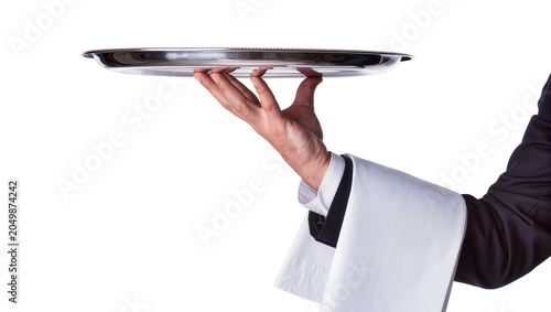 Konstfotografi Waiter s hand holding a polished silver serving tray, isolated on transparent ba
