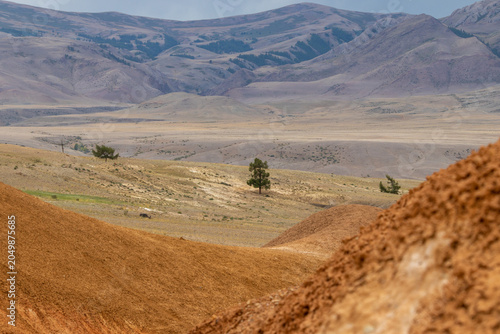 Colorful hills in Altai Republic, named Mars 3. Nature environment background. Natural colored texture of sandstone Martian landscape