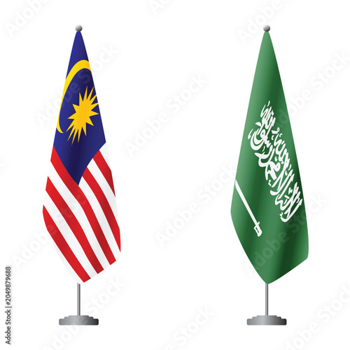 Photography Malaysia and Saudi Arabia flags on flagpoles for official ceremonies and meeting