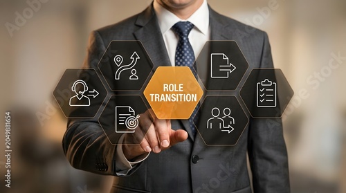 Business professional touches a digital screen displaying a role transition concept with various organizational icons to manage modern career changes.