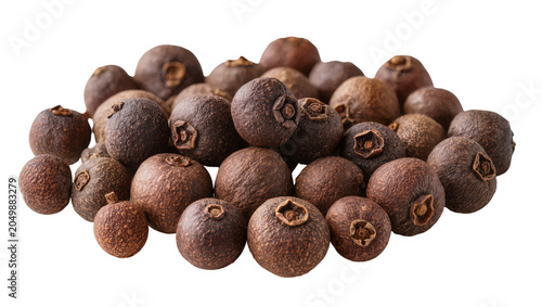 Fotografie Pile of whole allspice berries with textured brown surfaces, isolated on transpa