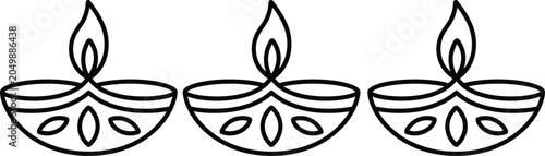 Tableau sur toile Three lit diya oil lamps for diwali festival