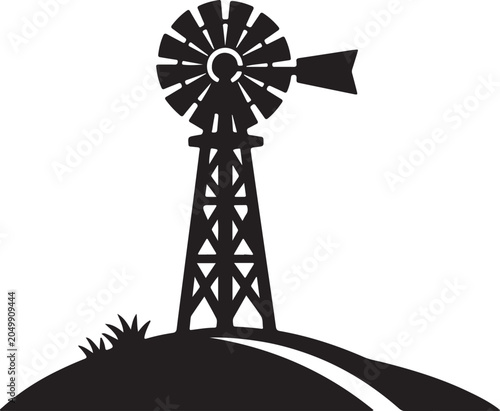 Classic windmill on a small hill silhouette