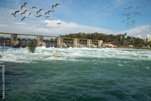 Bild auf Leinwand The old dam gates on the Seyhan River in Adana were reopened after many years due to excessive rainfall, revealing magnificent views that were photographed