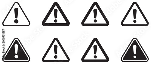 Foto Several black triangular warning signs with exclamation mark inside and outside symbol