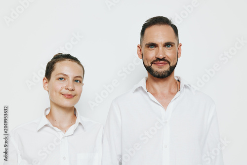 Photos A professional man and colleague stand on a clean white background, projecting confidence and calm for corporate, business, and success themed visuals suitable for modern workplaces