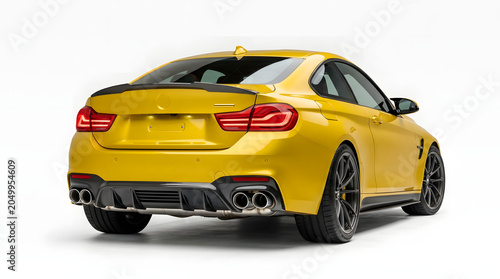 Yellow sports car rear view.