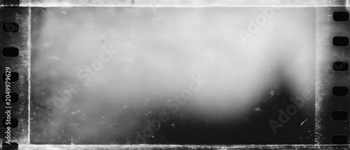 Εκτύπωση καμβά Vintage film strip shows grainy, faded black white image