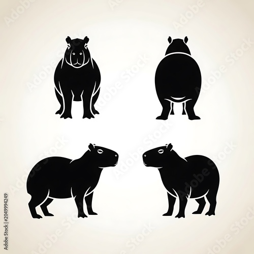 Black silhouette dogs in various poses standing.