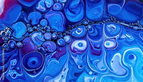 Abstract blue and purple oil bubble fluid pattern.